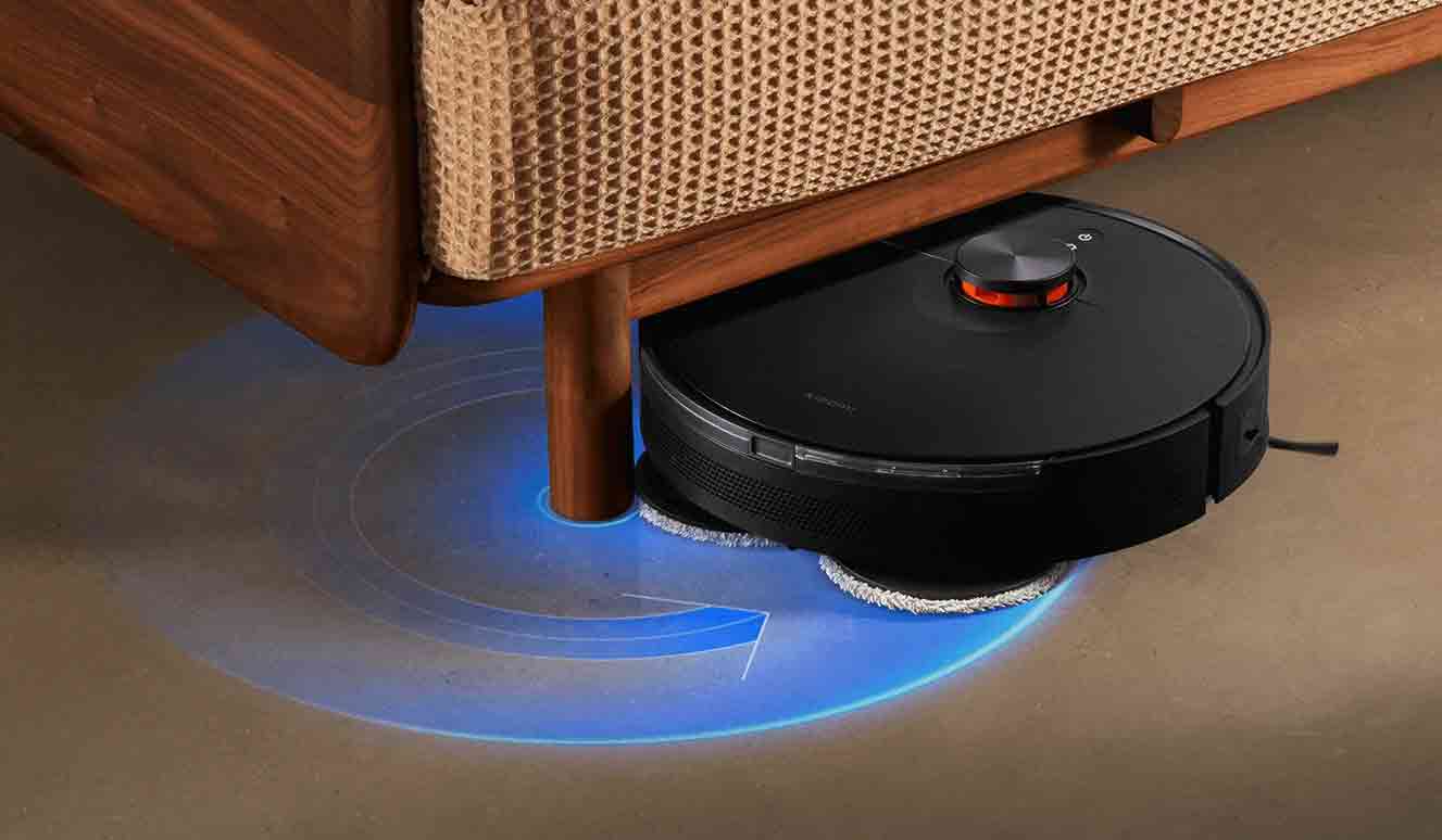 L'aspirateur robot dispose de capteurs latéraux et de capteurs d'obstacles censés lui permettre d'éviter les objets et meubles et de nettoyer au plus près d'eux.