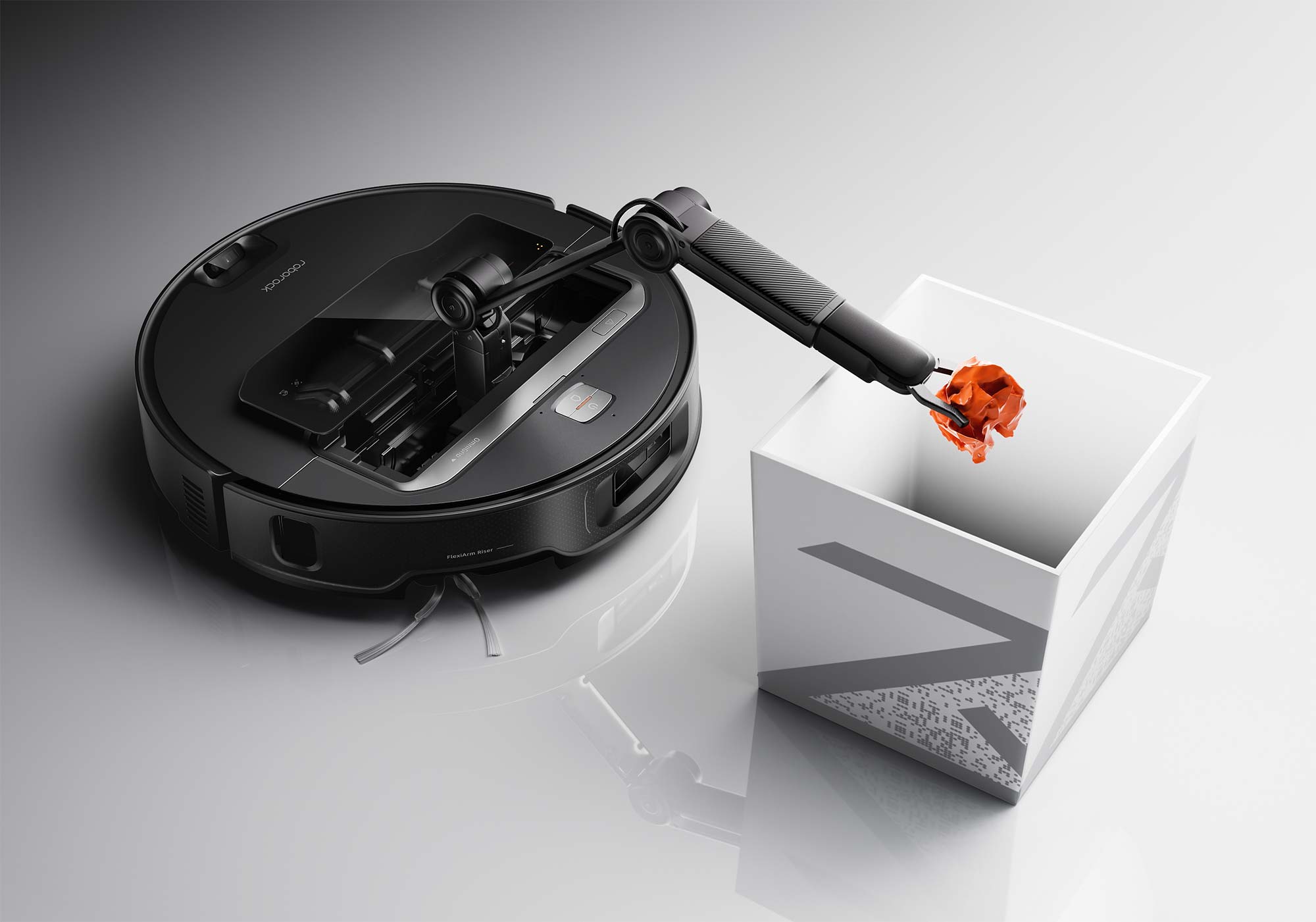 Le Roborock Saros Z70 déplace jusqu'à 300 g d'objets et les range dans une zone ou un bac dédié, libérant votre sol.